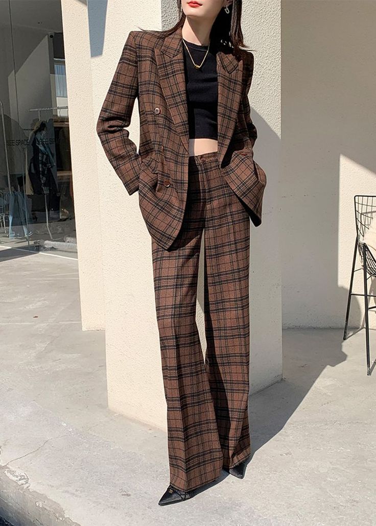 Indulge in luxury with our Nadia Coffee Plaid Blazer Wide Leg Pantsuit. This double-breasted set features a sophisticated and exclusive coffee plaid blazer and wide leg pants. Elevate your style and make a statement with this elegant and tasteful ensemble. Perfect for the fashion-forward and confident woman. Notched lapels Long sleeve Double-breasted button closure Wide leg pants Polyester,Spandex Item #241172 Women's blazer & wide-leg pants set SIZE INFO XS=US2=UK6=EU32 S=US4-6=UK8-10=EU34-36 M Formal Plaid Wide Leg Pants, Chic Double-breasted Plaid Blazer, Elegant Plaid Wide-leg Pants, Fitted Plaid Double-breasted Blazer, Plaid Wide-leg Pants With Pockets, Plaid Blazer, Confident Woman, White Blazer, Polyester Spandex