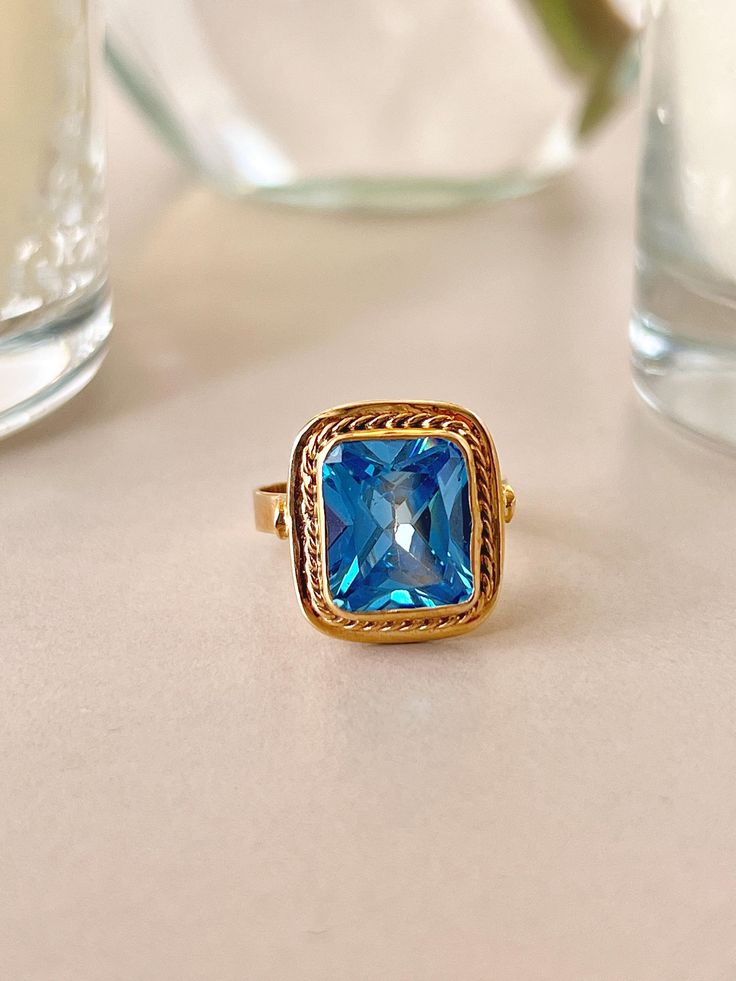 14K Solid Gold Blue Topaz Ring, Vintage Ring, Gift For Mom, Real Gold Ring, Blue Topaz, Gemstone Ring, Christmas Gift, Natural Stone Ring PRODUCT DETAILS Made to order Material: 14K Solid Gold PACKAGING All items are nicely packaged ready to gift in elegant jewelry boxes. You can also leave a gift message for the recipient at checkout. Information:  If you want to get information about our products, you can contact us. Shipping:  Your gold jewelry is sent by international express shipping. (UPS) Blue Topaz Gemstone, Ring Blue, Blue Topaz Ring, Topaz Gemstone, Vintage Ring, Topaz Ring, Ring Vintage, Elegant Jewelry, Stone Ring