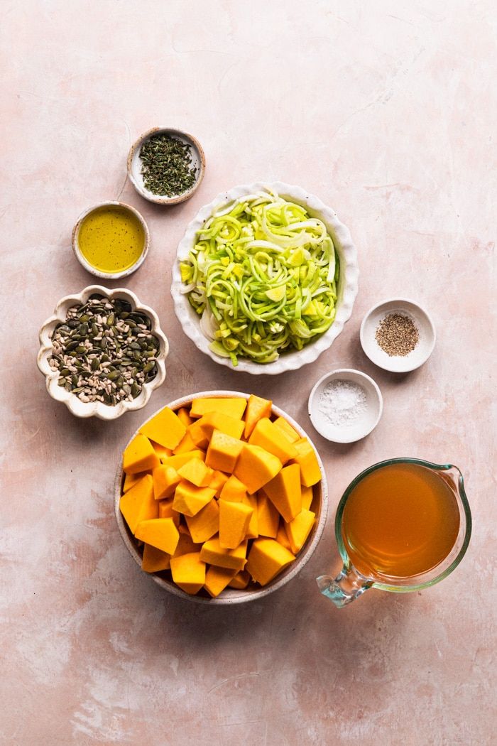 bowls filled with food sitting on top of a table