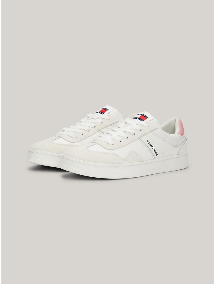 Tommy Hilfiger women's sneaker. Suede uppers in a mix of textures give these sneakers an elevated athleisure look, complete with contrast accents and branding. Part of our Tommy Jeans collection.  Material: 100% Suede. Sporty Platform Sneakers With Logo Detail And White Sole, Sporty Lace-up Sneakers With Logo Detail, Lace-up Sneakers With Logo Detail For Jogging, Lace-up Sneakers With Logo For Jogging, Lace-up Jogging Sneakers With Logo Detail, Low-top Synthetic Sneakers With Logo Detail, Synthetic Low-top Sneakers With Logo Detail, Low-top Synthetic Sneakers With Logo, Casual Low-top Platform Sneakers With Logo Detail