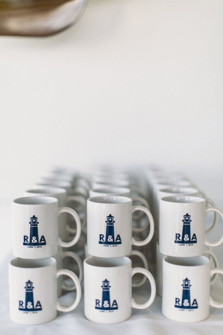 six coffee mugs sitting next to each other on a table