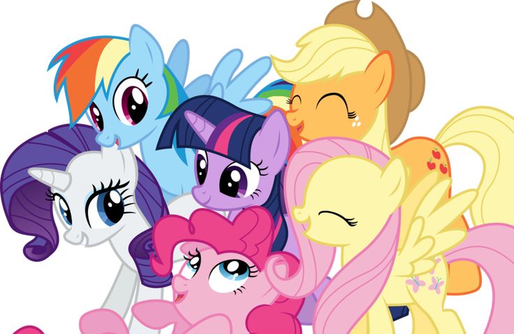 a group of little pony standing next to each other