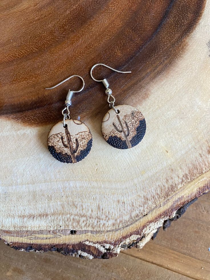 Lightweight and comfortable to wear!  Hand burned wood earrings Nickel-free earring hooks Natural Wood Drop Earrings For Pierced Ears, Brown Wooden Drop Earrings, Brown Wood Drop Earrings, Brown Wooden Earrings For Pierced Ears, Nature-inspired Brown Earrings With Ear Wire, Rustic Drop Earrings With Ear Wire, Brown Wooden Round Earrings, Everyday Brown Wood Earrings, Natural Color Round Earrings For Pierced Ears