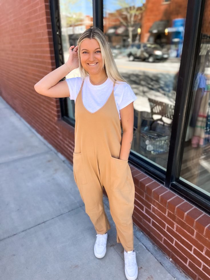 Introducing the cozy Onesie Rib Knit Jumpsuit in a warm tan color. Made with a thick, comfy material, this jumpsuit is perfect for lounging around the house or staying warm on chilly nights. It's the ultimate combination of comfort and style. Sorry, onesie dance moves not included. Brown Cotton Winter Jumpsuits And Rompers, Comfortable Overall Jumpsuits And Rompers For Loungewear, Comfortable Jumpsuits And Rompers For Loungewear, Comfortable Jumpsuits And Rompers With Pockets, Brown Loungewear Jumpsuits With Pockets, Comfortable Leisure Overalls And Rompers, Casual Brown Cotton Jumpsuits And Rompers, Lounging Jumpsuits And Rompers, Cozy Cotton Jumpsuits And Rompers For Loungewear