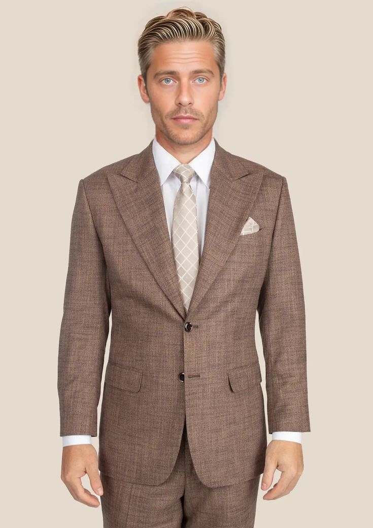 Be the best dressed at your next event with the Tawny Brown Hopsack Suit. This cool and stylish suit exudes elegance and luxury. Custom made from a luxurious bamboo/wool/linen/silk blend from Cavani, you're guaranteed to look as good as you feel. Dress to impress with this must-have suit. Suit Guide, Tawny Brown, Custom Made Suits, Stylish Suit, Vest And Tie, Linen Suits, Tuxedo Shirts, Tuxedo Suit, Cotton Chinos