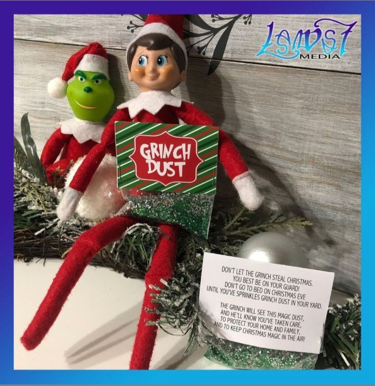 an elf with a grinch dust sign next to a christmas ornament