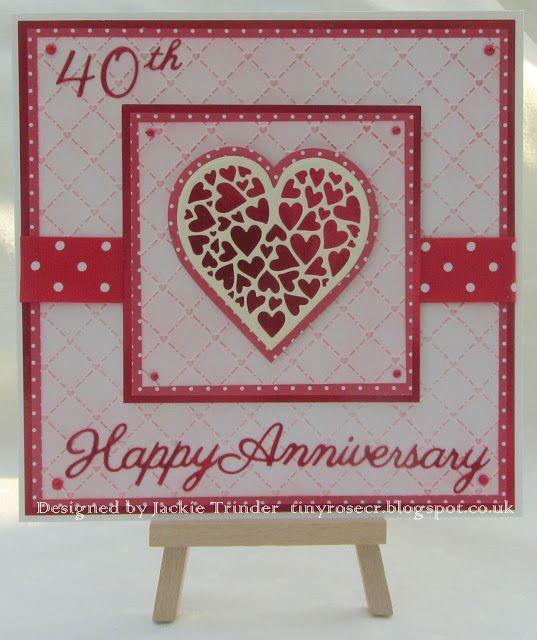 a happy anniversary card with a heart on it