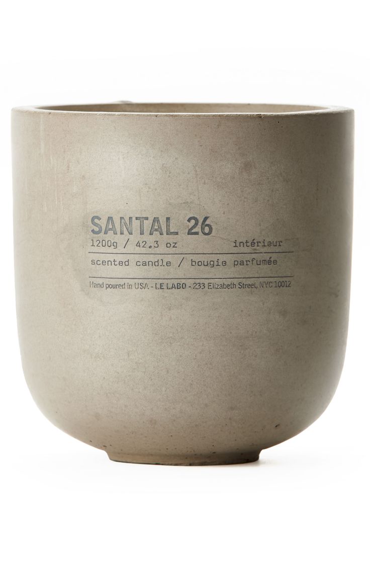 a large white vase with the words santal 26 printed on it's side