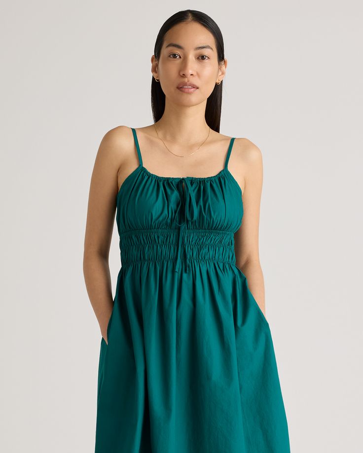 Discover the effortless charm of our 100% Organic Cotton Keyhole Midi Dress. Crafted with care from premium organic cotton poplin, this must-have dress has a cool, crisp look and a lightweight feel. The smocked bodice hugs your ribs in a flattering yet comfortable way, while the front tie and adjustable straps allow you to customize the fit. Best part: it has pockets! Easy to dress up or down, this chic silhouette works for a range of occasions.  | Quince | Women's Keyhole Midi Dress in Garden G Relaxed Cotton Dress For Garden Party, Relaxed Fit Cotton Dress For Garden Party, Casual Cotton Dress For Garden Party, Casual Cotton Mini Dress For Garden Party, Cotton Relaxed Fit Sundress Midi Dress, Cotton Sundress For Daywear, Cotton Ruched Sundress Midi Dress, Cotton Ruched Midi Sundress, Casual Cotton Midi Dress With Smocked Back