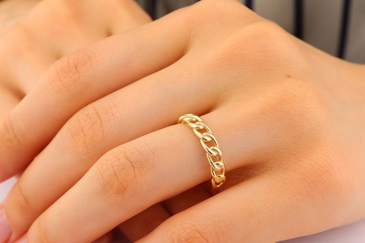 Introducing our exquisite 14K Solid Gold Chain Ring, a true reflection of elegance and timeless beauty. Crafted with precision and care, this ring is made from 14K solid gold, ensuring durability and a stunning shine that will last a lifetime. The delicate chain design adds a touch of sophistication, making it a perfect accessory for any occasion. Each link is meticulously connected, creating a seamless and comfortable fit. This ring is a testament to the craftsmanship and attention to detail th Fine Jewelry Rings With Adjustable Chain For Formal Occasions, Minimalist Gold Chain Jewelry For Anniversary, Elegant Open Rings With Adjustable Chain, Simple Gold Plated Rings For Wedding, Simple Gold-plated Wedding Rings, Elegant Open Ring Jewelry With Gold Chain, Simple Gold Plated Wedding Rings, Formal 14k Gold Chain Ring With Adjustable Chain, Formal 14k Gold Rings With Adjustable Chain