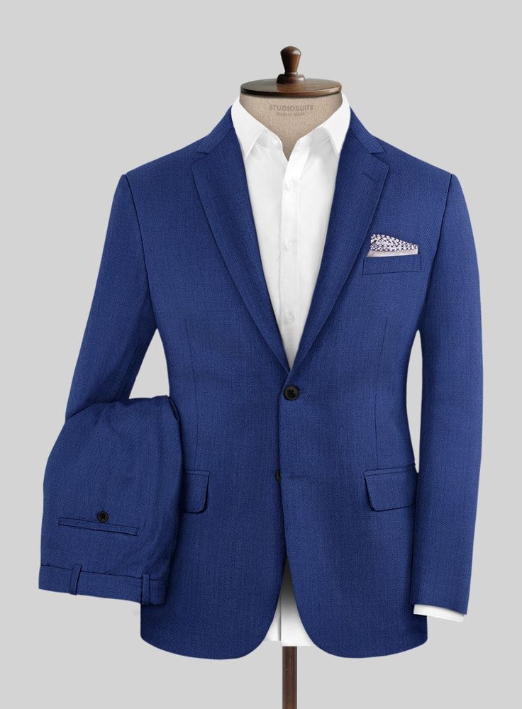 Make a bold statement with our Royal Blue Suit, a mix of impeccable style and unparalleled quality. Expertly crafted from a luxurious wool blend, this suit offers a sleek silhouette and a striking royal blue shade that commands attention. Perfect for making an impression at the office or captivating at special events, our blue suit ensures you're always the best dressed in the room. Experience perfect luxury and comfort, and make every moment an occasion to remember. Elevate your wardrobe today Blue Fitted Suit For Formal Occasions, Elegant Blue Suit In Suiting Fabric, Formal Fitted Blue Suit, Blue Fitted Formal Suits, Elegant Blue Collared Suit, Elegant Blue Three-piece Suit For Semi-formal Occasions, Elegant Blue Semi-formal Three-piece Suit, Elegant Blue Suit, Luxury Fitted Blue Three-piece Suit