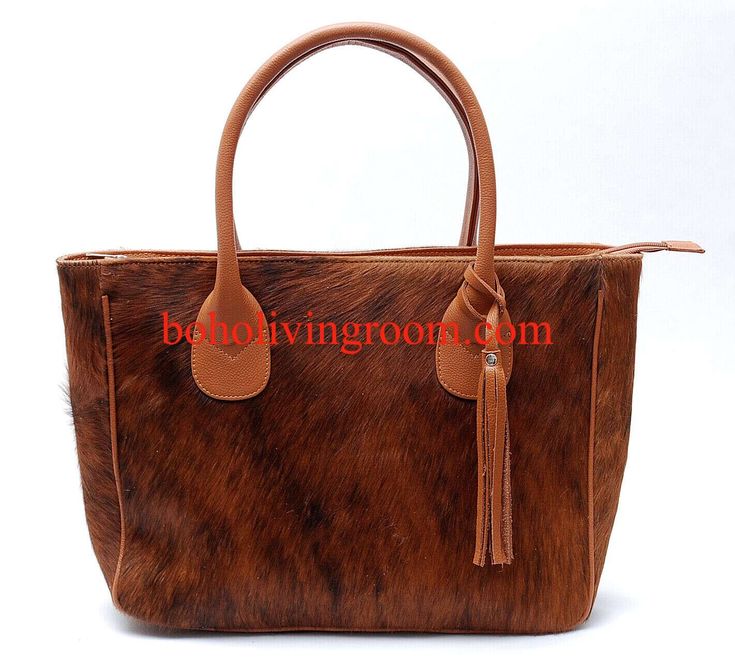 Discover a beautiful solid brown cowhide tote purse, ideal for daily use and western-themed occasions. The perfect gift for her! Free shipping on all our hair on cowhide purses. Handcrafted from real hair on cowhide leather. Non-rusty metal accessories. Cotton inner fabric lining. This size of this cowhide bag is approx Size:16"(L) x 14"(H) x 5"(W) Each cowhide purse is custom made to order and takes approx seven business days to complete each bag. A cowhide purse is a stylish and versatile acce Rodeo Events, Cowhide Purse, Cowhide Bag, Thoughtful Gifts For Her, Brown Cowhide, Solid Brown, Fashion Enthusiast, New Accessories, Rusty Metal