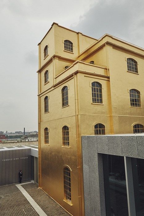 a tall building sitting on top of a roof