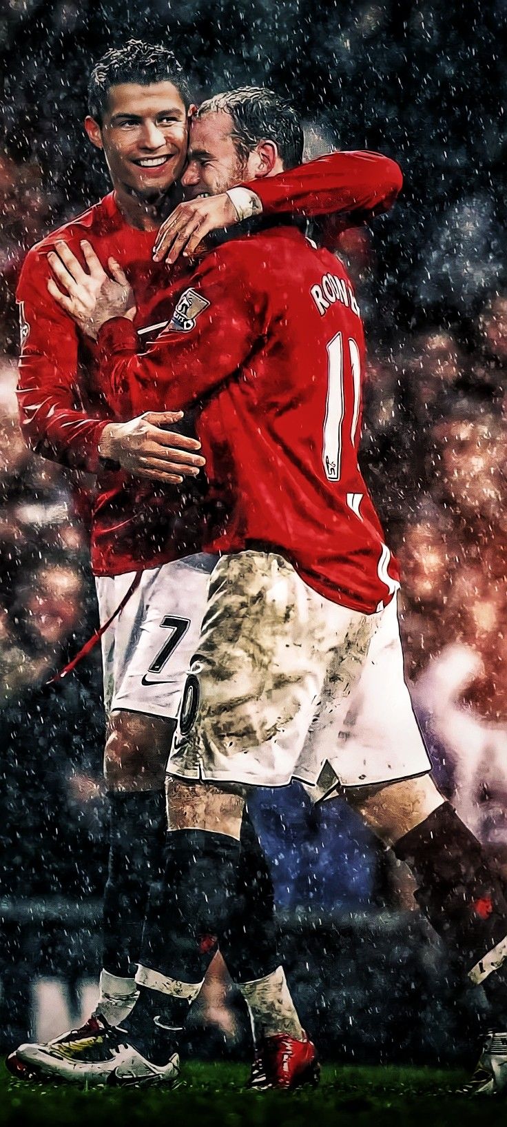 two soccer players hugging each other in the rain