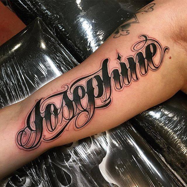 a man's arm with the word together on it, in cursive font