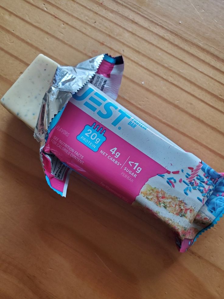 a bar of candy sitting on top of a wooden table