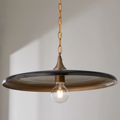 a light fixture hanging from a ceiling in a room