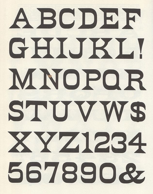 an old fashioned type of alphabet with numbers and letters on it's sides, all in black