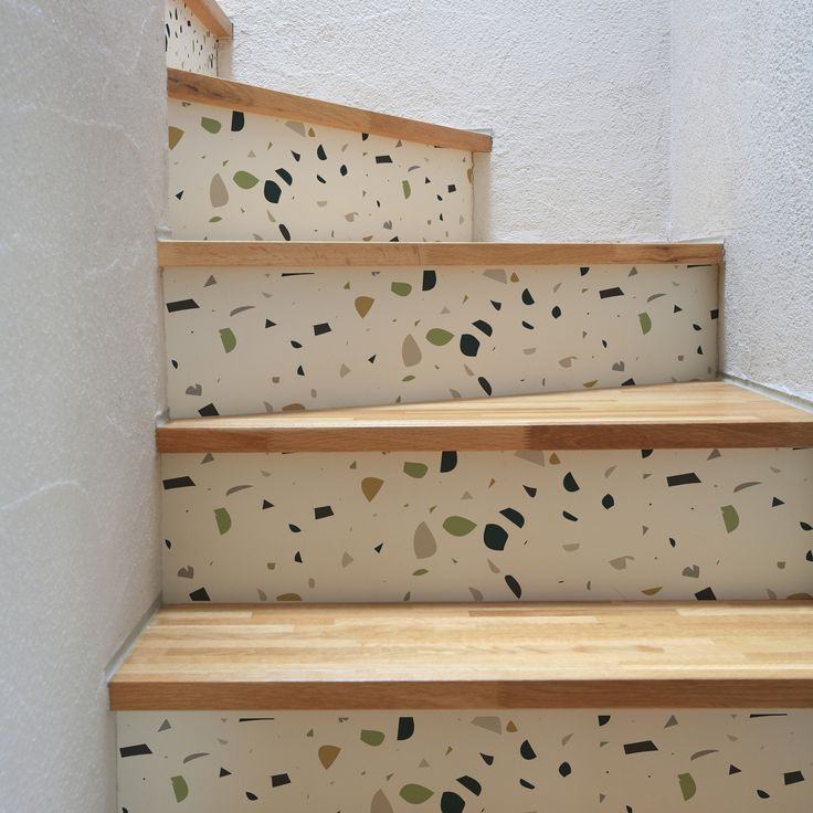 the stairs are painted with different colors and shapes