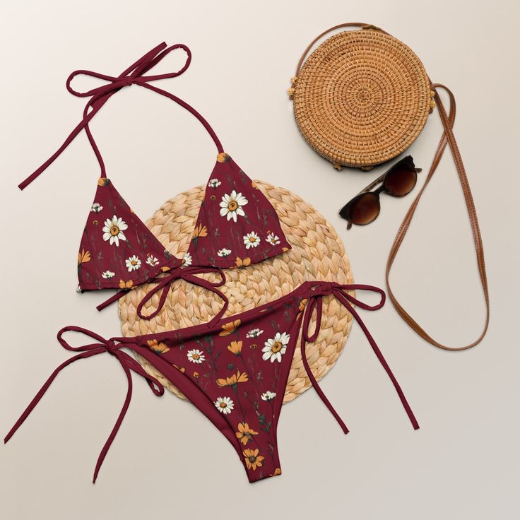 The burgundy red string bikini set with meadow flowers has a burgundy red lining. It's available in sizes up to 6XL. Bikini tops and bikini bottoms are also sold separately in this shop. Please check the sizing chart between the listing photos. In case of any questions feel free to message me. Item is custom-made per order. The bikini set was designed by me and it's made by Printful in their production facilities in Europe or the USA. Item is sent from the production facility nearest to you. Ite Red Floral Print Swimwear For Beach Party, Red Fitted String Swimwear, Fitted Red String Swimwear, Red Floral Print Swimwear For Pool, Red Floral Print Swimwear For Beach, Red Floral Print Swimwear For The Beach, Red Floral Summer Swimwear, Red Floral Print Summer Swimwear, Adjustable Red Swimwear For Beach