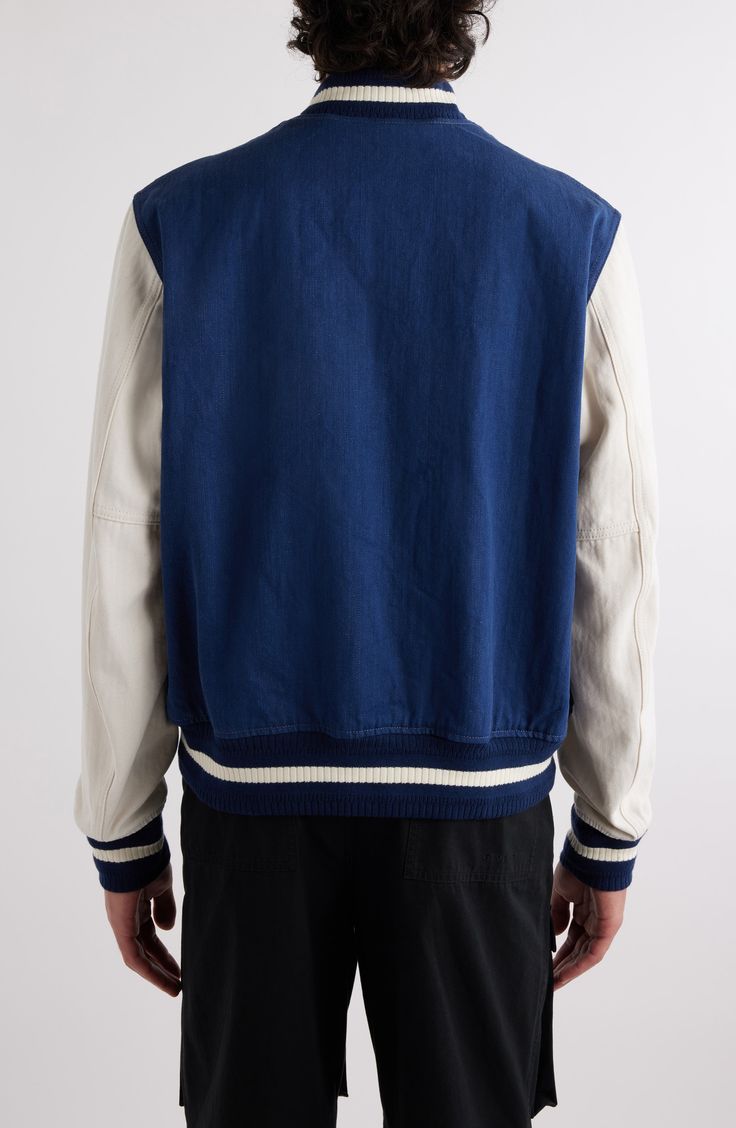 The house's founding is embroidered at the chest of this all-cotton varsity jacket featuring a herringbone weave on the sleeves for requisite contrast texture. 27 1/2" length (size 50EU) Front snap closure Band collar Front welt pockets Ribbed cuffs and hem 100% cotton Dry clean Made in Italy Designer Clothing Sporty Cotton Varsity Jacket With Embroidered Logo, College Style Cotton Outerwear With Embroidered Logo, Cotton Outerwear With Embroidered Logo For College, Cotton Varsity Outerwear With Baseball Collar, Collegiate Cotton Varsity Jacket With Embroidered Logo, Cotton Varsity Jacket With Embroidered Logo, College Cotton Varsity Jacket With Baseball Collar, White Cotton Track Jacket With Baseball Collar, Classic Cotton Outerwear With Embroidered Logo