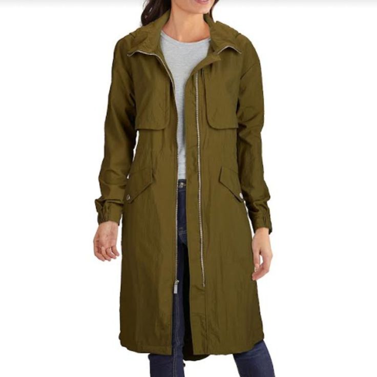 Kenneth Cole Women's Crinkle Hooded Anorak Coat Price Drop - Just Reduced This Below The Knee Anorak Is Sure To Please, It Is Dressed In A Cool Crinkle Nylon Fabric With A High-Low Hem And Attached Hood. Details: -Size: Xs -Color: Olive -Attached Hood, Zig Zag Details -Crinkle Fabric -Exposed Center Front Zip -Hidden Inner Draw Cord -High Low Hem With Back Stopper -Imported -Lined -Stand Collar With Attached Hood -Machine Washable -Nylon - N;Lt #050 Thanks For Dropping By Our Closet And Supporti Khaki Nylon Parka For Fall, Olive Outerwear With Detachable Hood For Fall, Olive Hooded Utility Outerwear, Olive Hooded Utility Parka, Casual Khaki Nylon Outerwear, Fall Khaki Nylon Utility Jacket, Long Sleeve Parka For Fall Travel, Casual Hooded Parka For Travel, Fall Travel Long Sleeve Parka