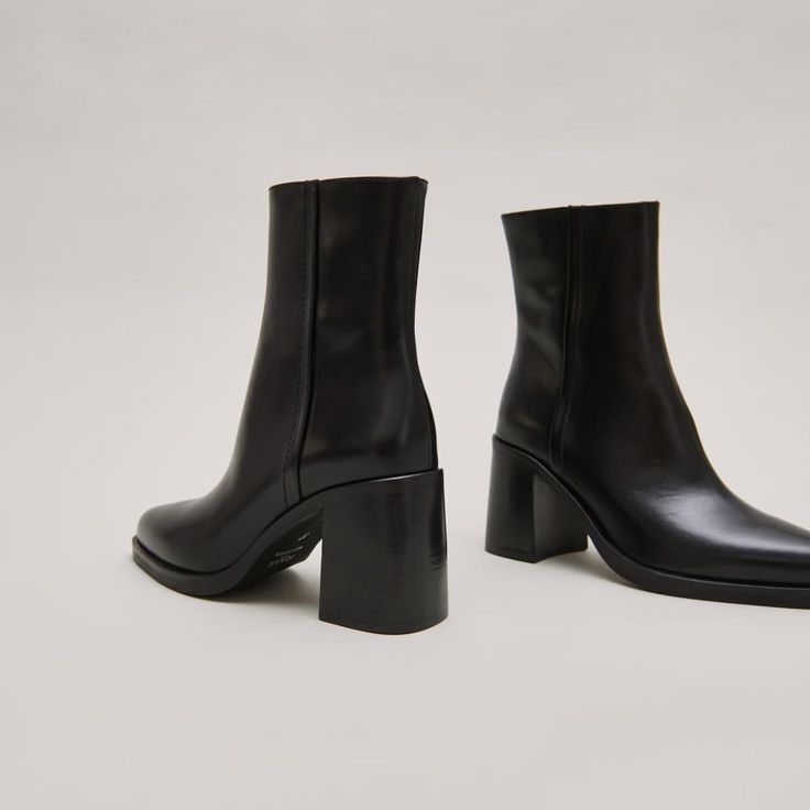 Introducing the DOLOR, a sleek pointed-toe ankle boots with a square heel, in timeless, classy black to complement your seasonal outfit.This model fits normally, we advise you to take your usual size.Heel: 6.5 cmUpper height: 15 cmCalf circumference: 22cmMade in: Portugal Trendy Ankle Heeled Boots For Work, Fall High Ankle Heeled Boots For Work, Classic Pointed Toe Heeled Boots For Fall, Classic Heeled Boots With Pointed Toe For Fall, Trendy High Ankle Heeled Boots For Work, Chic Pointed Toe Chelsea Boots For Work, Chic Square Toe Chelsea Boots For Winter, Fall Formal Platform Boots With Sculpted Heel, Chic Fitted Chelsea Boots With Square Toe