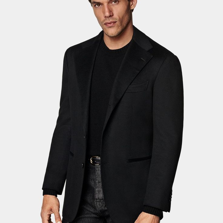 This black blazer is cut to a relaxed fit, providing a roomy chest and shoulders with natural shoulders. It features a single-breasted closure, wide notch lapels, and jetted pockets. Black Luxury Blazer With Welt Pockets, Luxury Black Blazer With Welt Pockets, Black Blazer With Pressed Crease And Lapel Collar, Black Wool Blazer With Pressed Crease, Black Blazer With Pressed Crease, Black Wool Blazer With Notch Lapel, Black Wool Blazer With Single Button, Classic Black Blazer With Welt Pockets, Black Tuxedo Blazer With Pockets