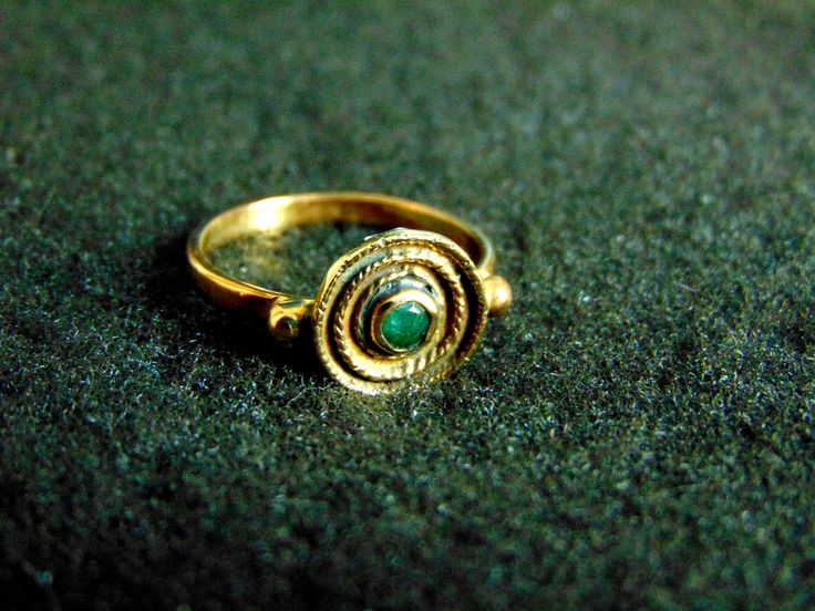 Beautiful women's gemstone ring. It is made completely out of 14k gold (aka gold 585 each piece is stamped), with a stunning emerald in its center... Gold Emerald Ring With Hallmarked Round Band, 14k Gold Byzantine Style Rings, 14k Gold Byzantine Round Ring, 14k Gold Byzantine Style Round Rings, Yellow Gold Byzantine Hallmarked Rings, Gold Emerald Ring With Stone Setting For Anniversary, Traditional 14k Stamped Round Rings, Byzantine Ring With Bezel Setting For Gift, Gold Emerald Ring With Stone Setting