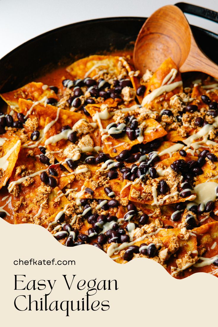 an easy vegan enchiladas recipe in a skillet with a wooden spoon