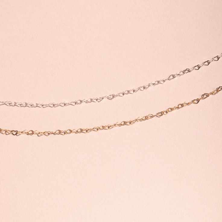 A chain made of tiny hearts, linked together one to the next. The ultimate friendship bracelet. Rose Gold Adjustable Chain Bracelet For Friendship, Delicate Link Chain Bracelet, Delicate Chain Link Bracelet, Delicate Link Chain Bracelet With Adjustable Chain, Dainty Oval Link Cable Chain Bracelet, Sterling Silver Adjustable Chain Bracelet For Friendship, Dainty Delicate Chain Link Bracelet, Dainty White Gold Link Chain Bracelet, Dainty White Gold Cable Chain Bracelet