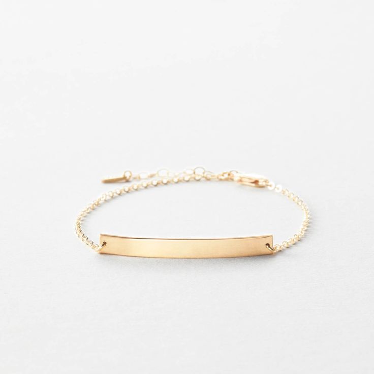 Perfect for dates, names, inspirational words... a piece to wear every day. Dainty Engraved Bracelets For Everyday Wear, Dainty Engraved Bracelets For Everyday, Dainty Engraved Bracelet For Everyday Wear, Dainty Everyday Engraved Bracelets, Classic Everyday Gold Bracelet Engraved, Everyday 14k Gold Engraved Bracelet, Minimalist Sterling Silver Nameplate Bracelet, Elegant Engraved Chain Bracelet For Everyday, Minimalist Nameplate Bracelet