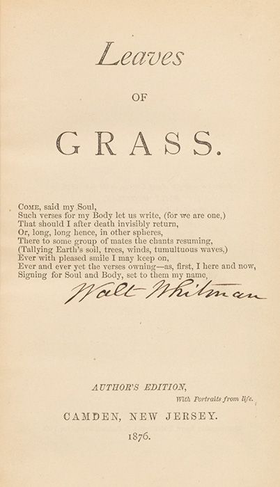 an old book with writing on the front and back cover that says leaves of grass