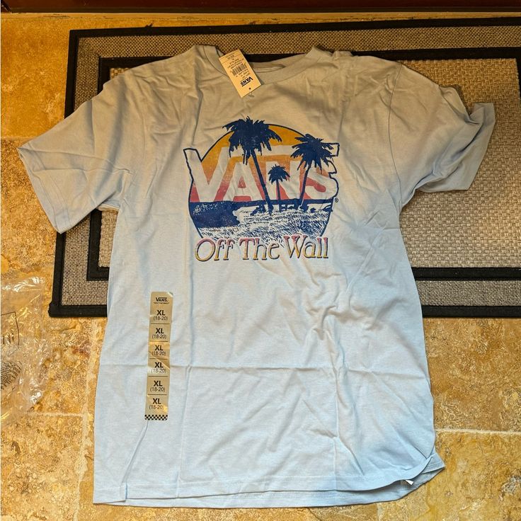 Baby Blue Light Van Shirt Vans Blue Short Sleeve Tops, Blue Short Sleeve Vans Top, Vans Letter Print T-shirt For Summer, Vans Cotton Summer Tops, Vans Cotton Tops For Summer, Vans Graphic Tee For Summer, Vans Graphic Tee Tops For Summer, Vans Summer Graphic Tee Tops, Blue Cotton Vans Top