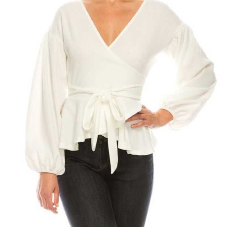 Off White Blouse V-Neck. Perfectly Pair This With Jeans Or Pencil Skirt, This Top Totally Works. 85% Polyester 5% Spandex. Chic Stretch Wrap Top For Spring, Stretch Wrap Top For Work, White Fitted Wrap Top For Spring, Fitted Wrap Top For Brunch, Chic Fall Wrap Top For Brunch, Versatile Fitted Wrap Blouse, Fitted Long Sleeve Wrap Top For Brunch, Chic Fitted Wrap Top For Brunch, V-neck Wrap Top For Spring Brunch