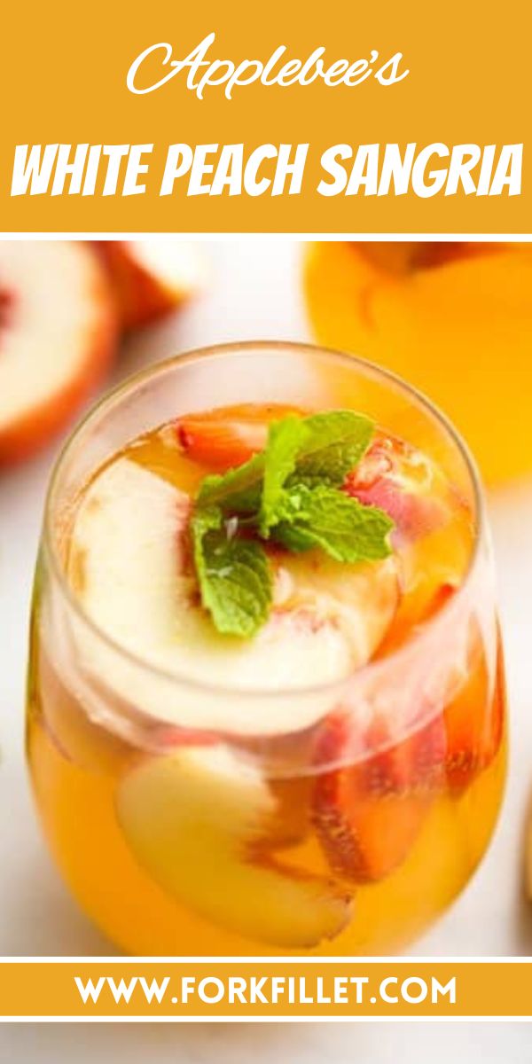 an appetizer with white peach sangria and mint garnish in it