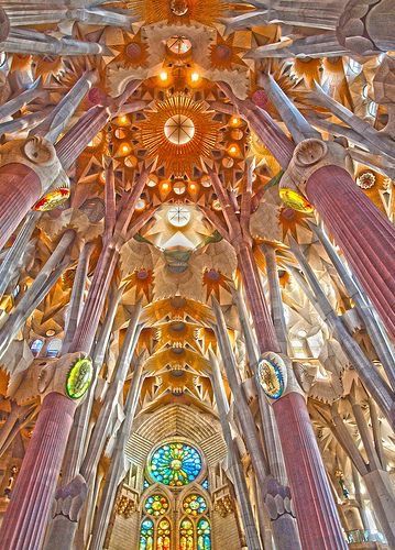 the inside of a cathedral with many windows