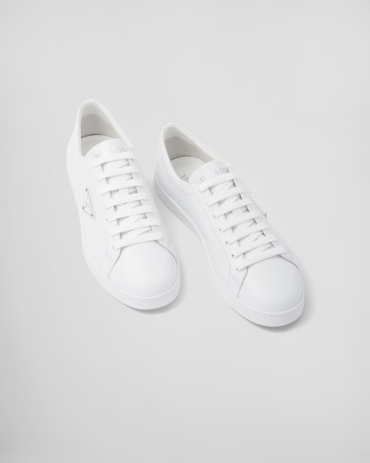 White Brushed Leather Sneakers | PRADA Prada Sneaker, Coffee Line, Minimalist Sneakers, Prada Sneakers, Prada Collection, Tableware Collection, Triangle Logo, Fine Porcelain, All White