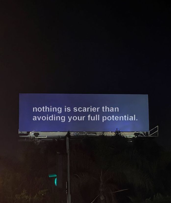 there is a sign that says nothing is scarier than avoiding your full potential