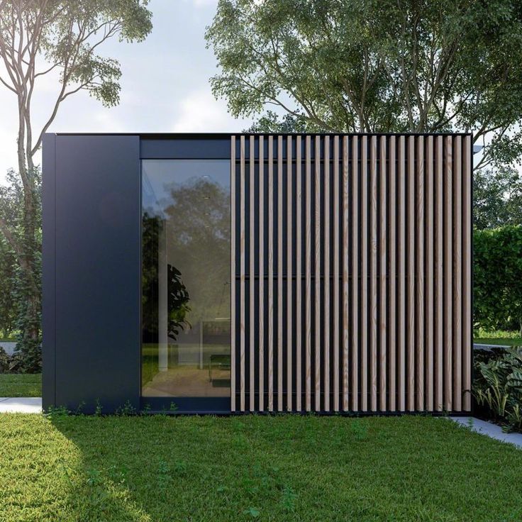 a modern house with wood slats on the side