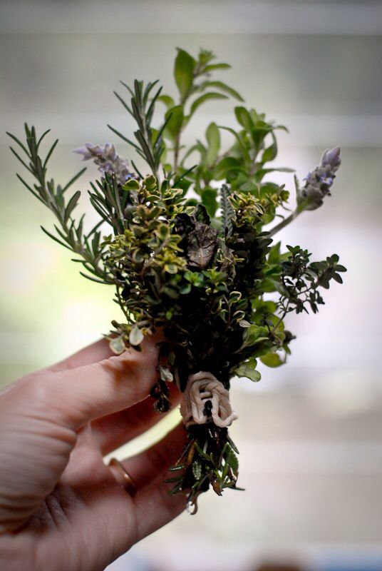 someone is holding flowers in their hand with the caption rosemary thyme heather bouquet