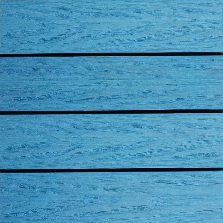 a blue wooden surface with black lines on it