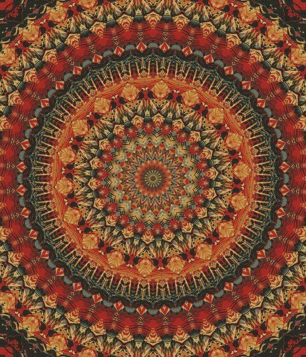 an intricate red and yellow circular design with many details in the center, on a black background