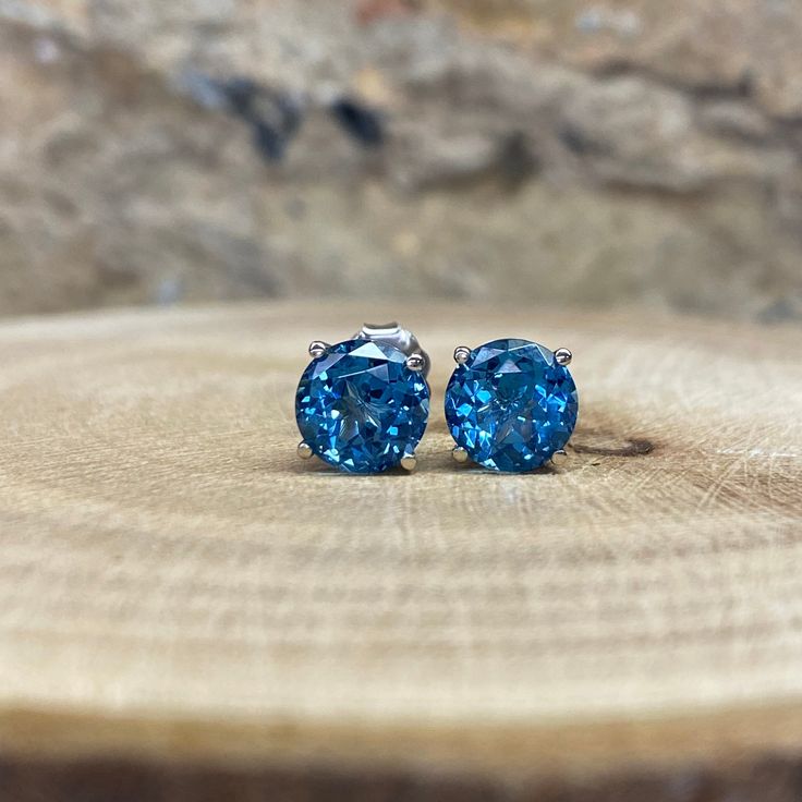 Sleek sellouts! 🤓. Order Round Cut London Blue Topaz Stud Earrings 14K White Gold Unisex Blue Topaz Earrings Round Blue Topaz Earrings Gold Stud Earrings #7284 at $256.00 #14kWhiteGold #GoldStudEarrings #BlueTopazEarrings #UnisexBlueTopaz #TopazStud #BlackFridaySale #EarringsRound #LondonBlue #RoundCut #EarringsUnisex Blue Birthstone Earrings For Formal Occasions, Formal Blue Birthstone Earrings, Blue Diamond Gemstone Earrings For Anniversary, Blue Prong Set Fine Jewelry Earrings, Blue Gemstone Diamond Earrings For Anniversary, Blue Earrings With Prong Setting For Anniversary, Classic Round Blue Topaz Earrings, Blue Round Diamond Earrings Fine Jewelry, Blue Diamond Cut Diamond Earrings