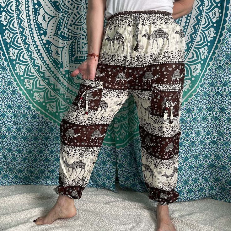 Thai Drawstring two pocket Harem Pants Waist: 23" - 46Hip: 50"Lenght: 43"Inseam: 28"Pockets: twoWeight: 170g Bohemian Lounge Pants With Pockets, Bohemian Loungewear Pants With Pockets, Bohemian Summer Cargo Pants With Pockets, Harem Loungewear Bottoms With Pockets, Relaxed Fit Hippie Bottoms With Pockets, Hippie Relaxed Fit Bottoms With Pockets, Hippie Bottoms With Pockets And Relaxed Fit, Relaxed Fit Pants With Pockets For Festival, Wide-leg Cargo Pants With Pockets For Festivals