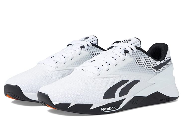 Reebok Nano X3 - Shoes : White/Black/Smash Orange : The stylish Reebok Nano X3 sneakers feature Floatride Energy Foam to provide lightweight, resilient, and ultra-responsive cushioning. Textile and synthetic upper. Textile lining and insole. Lace-up closure. Iconic logo on the heel tab. Round toe silhouette. Synthetic outsole. Imported. Measurements: Weight: 12 oz Product measurements were taken using size Men's 9, Women's 10.5, width Medium. Please note that measurements may vary by size. Ergonomic Training Sneakers With Shock Absorption, Technical Gym Sneakers With Shock Absorption, Technical Training Sneakers With Shock Absorption, Workout Sneakers With Shock Absorption, Dynamic Athletic Fit Trail Running Shoes For Gym, Functional Synthetic Running Shoes With Shock Absorption, Functional Running Shoes With Shock Absorption For Workout, Ergonomic Running Shoes With Shock Absorption For Training, Athletic Fit Synthetic Sneakers With Shock Absorption