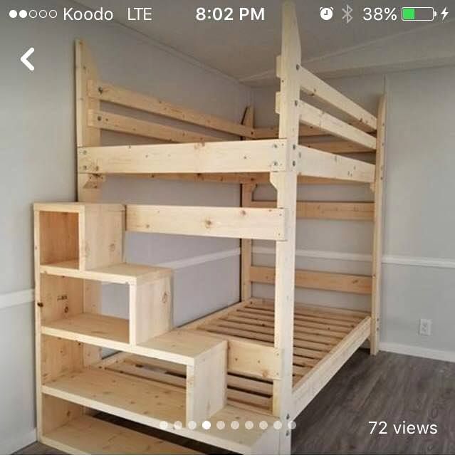 there is a bunk bed with stairs in the room