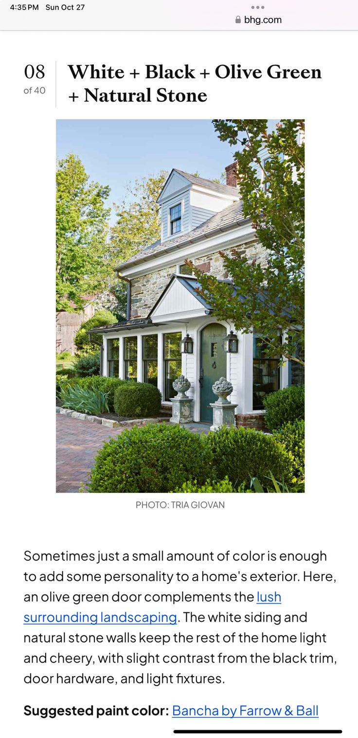 the front page of a magazine with an image of a white house and green bushes