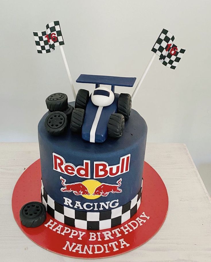 a birthday cake with a race car on top