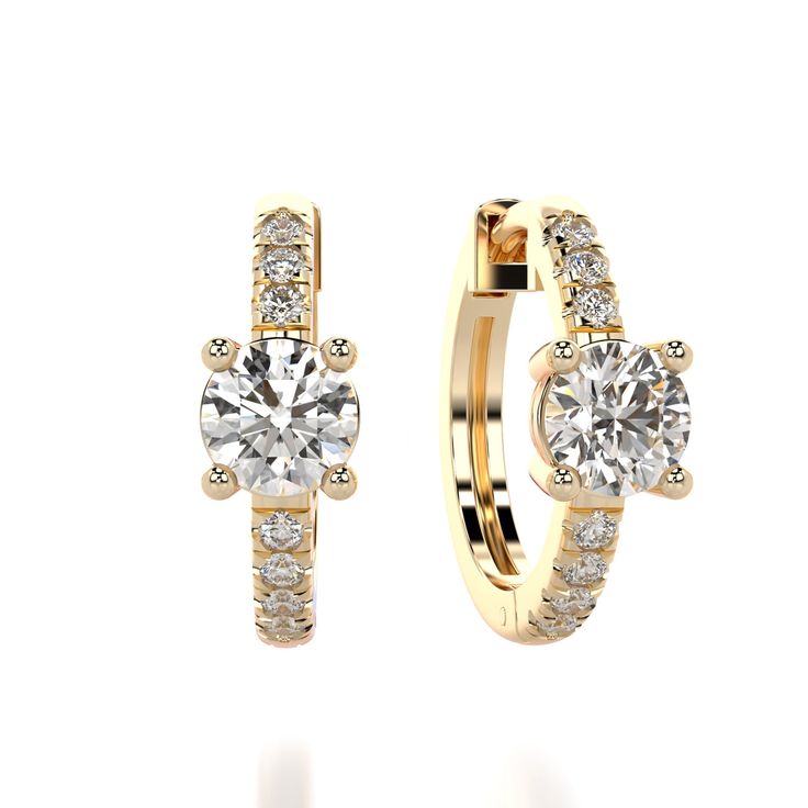 These classic, diamond hoop earrings are the perfect 14K solid gold diamond huggies. Sparkling diamond hoop earrings- modern, minimalist, chic, showcasing a center 0.5CT diamond with a pave of diamonds around it.  Materials & Measurements: ✤ Each center Diamond- 0.5CT Lab-grown: F+ color (or higher), VS2 clarity (or higher) ✤ 0.18CT lab grown side diamonds (in pair): D-F color, VS clarity ✤ 14K yellow/rose/white gold ✤ Inside diameter: 12mm ✤ Sold as a pair or a single earring ✤ Packed in a luxu Classic Round Huggie Earrings With Diamond Accents, Classic Diamond White Hoop Huggie Earrings, Classic Diamond White Huggie Earrings With Halo Design, Classic Hoop Earrings With Diamond Accents, Classic Diamond Huggie Earrings, Classic Huggie Earrings With Halo Design For Formal Occasions, Classic Formal Huggie Earrings With Halo Design, Classic Hoop Earrings With Single Cut Diamonds, Classic Small Hoop Huggie Earrings With Brilliant Cut